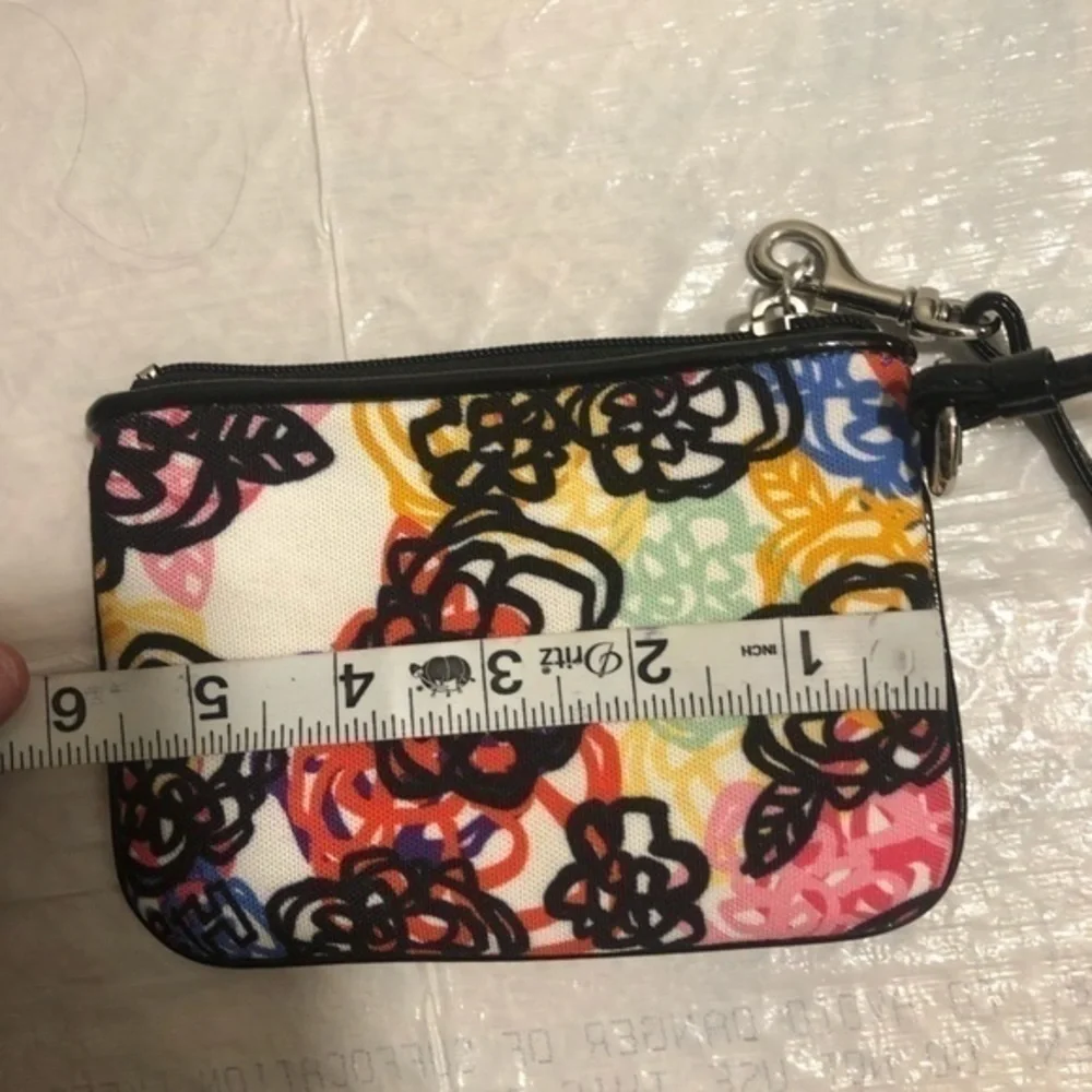 Coach poppy floral wristlet